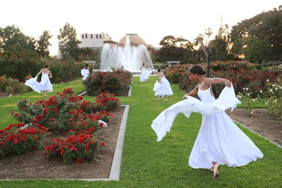Performers from the Debbie Allen Dance Academy led guests through the rose garden to dinner.
