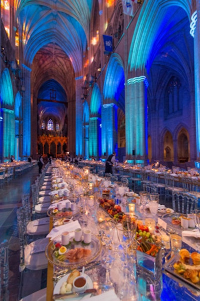 The U.S. Travel Association & Brand USA hosted an evening reception and dinner for 200 at the National Cathedral on June 3. Inside, Atmosphere Lighting illuminated the building in blue and red to accent the long mirrored tables from DC Rental, which CSI pushed together to create long king tables seating 20 to 24 people each.