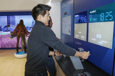 A hands-on racing challenge teaches visitors about braking features.