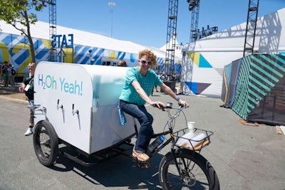 Six cyclists pulled mobile water-filling stations around the event, targeting areas where attendees gathered.