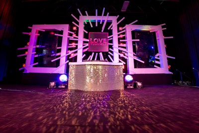 The event's theme of “Love Yourself” was incorporated into the decor, including a piece behind the DJ booth.