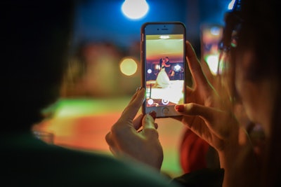 Many planners stress the importance of knowing the appropriate times to post and when to put one's phone away during a wedding.