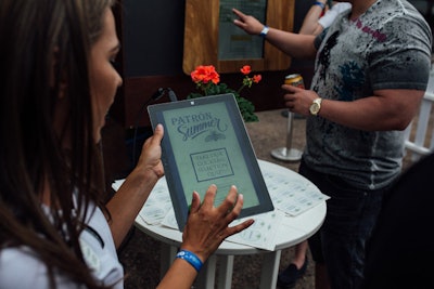 Guests answer three questions on a tablet to determine the cocktail that best matches their taste preferences.