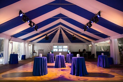 Bryan Rafanelli of Rafanelli Events lined the ceiling of one of the tents with blue and white stripped fabric. The decor 'gives the party a soul and a vibrancy, but also makes it warm,' he said.