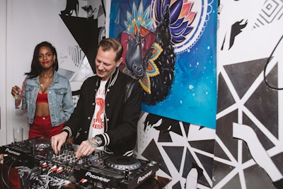 Design elements, including artwork behind the DJ booth, were a nod to Carter's aesthetic.