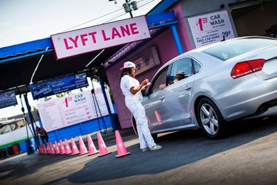 Lyft drivers are able to use a dedicated lane to get their $1 car washes from now through mid-August. Costumed brand ambassadors are on hand to lead drivers to the correct location.