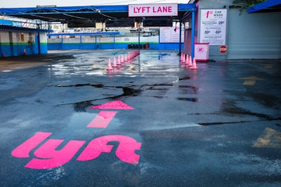 Signage on the ground also leads Lyft drivers to their dedicated car wash lane.