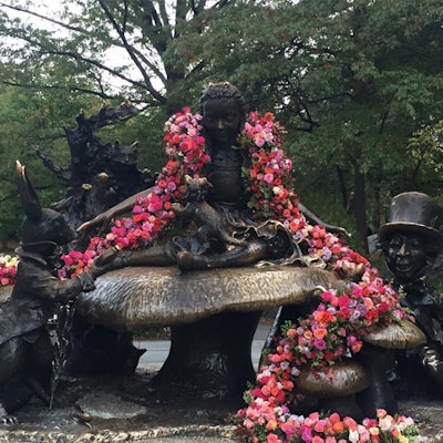 In November, Miller designed a 30-foot floral boa for Central Park’s Alice in Wonderland statue. The garland consisted of nearly 2,000 roses.