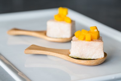 Opah belly poached in coconut oil with mango and papaya served as an hors d’oeuvre, by Eco Caters in Los Angeles and San Diego