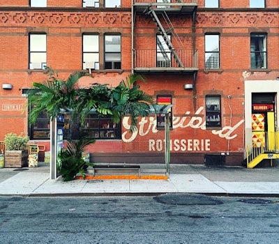 Miller also adorned the nearby bus stop with similar greenery and flowers.