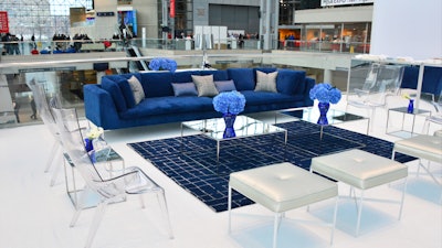 Tradeshow Lounge with Hudson Loveseats, Uncle Jim chairs and Reflection Coffee Tables.