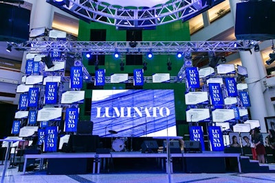 After the decision was made to postpone the annual Luminato gala to October, this year's opening party, held at the CBC Atrium, was more intimate, simple, and subdued, with a branded stage for a band and screens thanking donors.