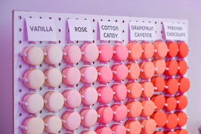 A peg wall of macarons arranged in an ombré display was accompanied by a selection of desserts, including unicorn chocolate bark and flavored marshmallows.