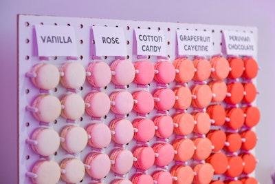 A peg wall of macarons arranged in an ombré display was accompanied by a selection of desserts, including unicorn chocolate bark and flavored marshmallows.