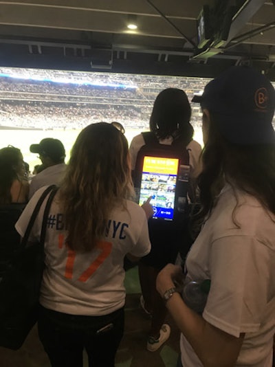 People in attendance with the foundation and general attendees were invited to print photo stickers using the screen.