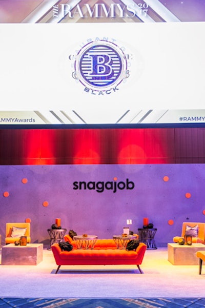The lounge area for Snagajob, an online listing of part-time jobs, incorporated the company’s signature orange.