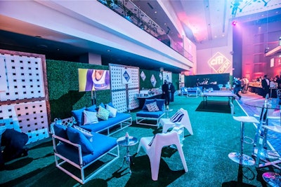 Design Foundry used wood panels and boxwoods to create a separate space for the Citi Open Player Party.