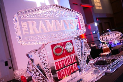 An intricate ice sculpture for sponsor Republic National Distributing Company topped one of the ballroom's bars.