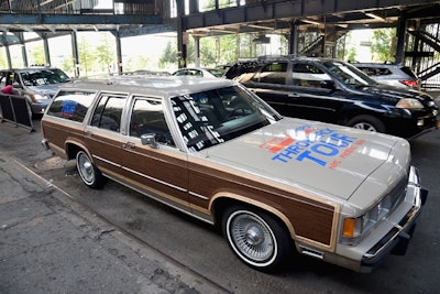 A branded vintage station wagon was parked outside the New York bar.