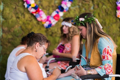 Guests at the after-party—who were encouraged to wear on-theme attire—could make their own floral crowns, then get henna tattoos from local artist Mountain Mehndi. Palm readings by Margaret Ruth were also available, as well as an oxygen bar by Water Fusion.