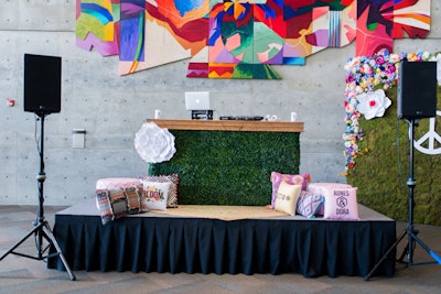 DJ booths were set up around the exhibit hall, and seating areas featured branded throw pillows, giving guests the opportunity to relax and listen to music between sessions.