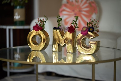 The house was full of playful, Instagram-friendly details, such as flower vases that spelled out the letters 'OMG.'