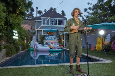 The beach house hosted several live performances, with talent including Steffan Argus (pictured) and Los 5. Other Awesomeness stars in attendance throughout the summer included Kandee Johnson, Claudia Sulewski, and Rebecca Black.