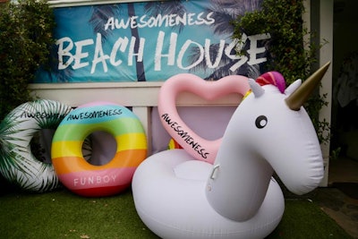Colorful inflatable floats and surfboards also created summery decor and fun photo ops, while the #Awesomeness hashtag was displayed prominently throughout the house and backyard.
