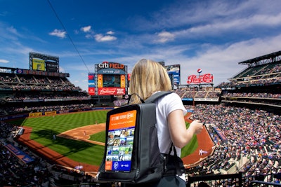 Representatives from the B Positive Foundation wore the backpacks during the game. The screens, which featured B Positive branding and Mets colors, curated social media photos that included the hashtag #BePosNYC.