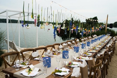 For the final dinner, held on July 28, the Popup Florist strung individual flowers in vibrant shades above the table.