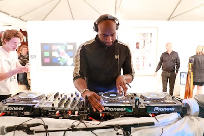 DJ Flat White—aka Virgil Abloh, the celebrated designer behind the Off-White fashion label—took care of the musical entertainment throughout the night. Abloh's invitation and request to DJ came from Alex Soros, the night's lead benefactor.