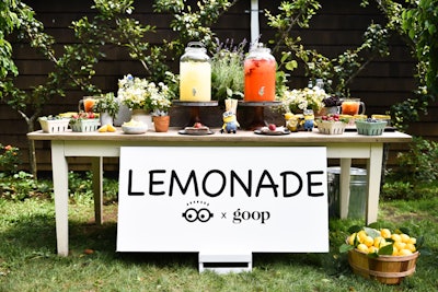 Catered by Peter Callahan, a lemonade stand offered a refreshments for both adults and children. Children's lemonade (classic or strawberry-infused) was served in mini, spill-proof plastic mason jars with yellow tops and yellow striped paper straws, while adults had the options of several add-ons: Opal basil, English mint, chocolate mint, lavender, mint simple syrup, ginger syrup, honey iced tea, and Pellegrino. Landmark Chardonnay was also served to the parents.