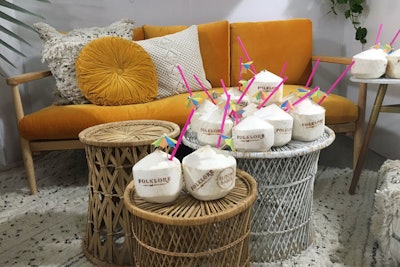 Folklore Vintage Rentals gave the floor a tropical-vibe with drinks served inside branded coconuts.