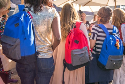 Attendees received branded backpacks.