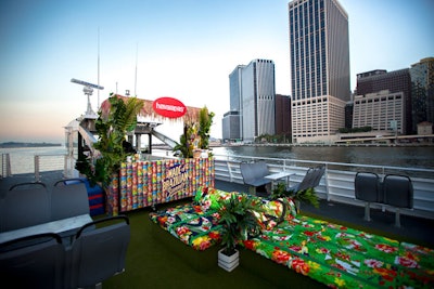 Havaianas worked with New Stand to remove seats from the roof, replacing them with a colorful daybed.