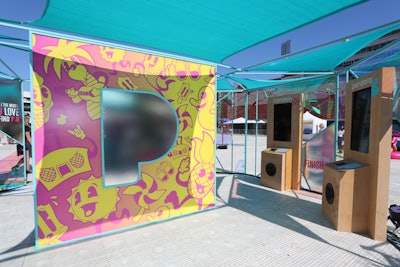 A custom-built geometric structure housed Pandora Premium kiosks, where guests could experience the newest features of the service and listen to a mixtape curated by the day’s performers. Brand ambassadors also handed out Pandora-branded swag, including trucker hats—which could be personalized at an airbrushing station—as well as branded pins and stickers.