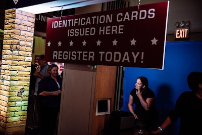 A photo booth activation by OM Digital served as the City DMV. Guests could input their own hero name and superpowers and receive an identification card as well as a GIF.