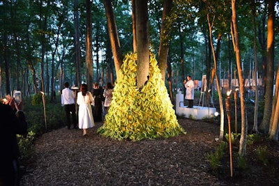 A pile of hundreds of bananas, both edible and not, served as a main focal point halfway through the forest of installations. Created by Niles Harris, 'A Monkey on His Back (Love Laboratory)' explored the objectification of the gay black male. Symbolically, an African-American model was housed at the top of the banana pile.