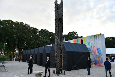 Nine black tarp tents feature video installations interspersed with live performance pieces by invited artists as well as the center’s International Summer Program participants.