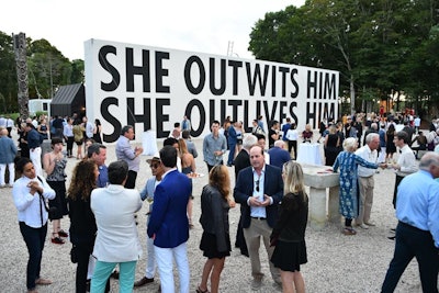 The 'Untitled' 90-foot wall in the main courtyard was a more-than-obvious response to President Trump's promise to build a Mexico border wall. Emblazoned with the wods 'She Outwits Him; She Outlives Him,' it was the night's most politically toned piece, not to mention the most Instagrammed. The text was meant to confront issues that are the forefront of contemporary U.S. politics and culture.