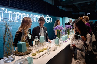 Against a custom-painted robin's-egg blue faux brick backdrop and neon sign, guests were received by Tiffany fragrance professionals who guided them through each of the scent's main notes. The setup also made for a popular Instagram moment.