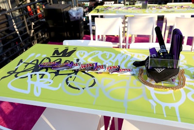 Tabletops featured custom graffiti, as well as swag and other giveaways from sponsors including Twix.