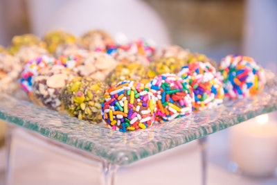 A dessert display included colorful brigadeiros, which are a Brazilian delicacy, from caterer Design Cuisine.