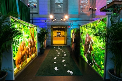 Guests entered the venue on a green carpet with orangutan foot and hand prints.