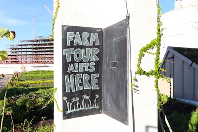 The event offered a guided tour of the farm, designated with a chalkboard sign.