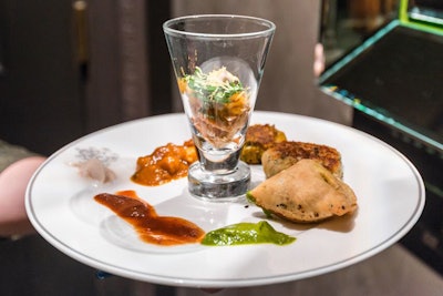 A plate of appetizers was served at the Pierre's Two e Bar/Lounge to shine a spotlight on Indian cuisine. Dishes serving on the opening sampler plate included a chicken samosa, vegetable shammi kebabs, and lobster chaat, along with mint, tamarind, and mango chutneys.