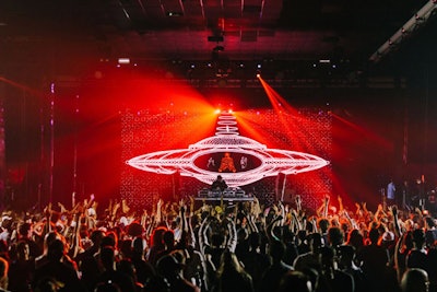 In keeping with Miami's status as a mecca for heavy bass music, Barclay Crenshaw delivered a set dressed in red-hued visuals at the indoor Main Frame stage. The artist and founder of Dirtybird Records is better known as Claude VonStroke.