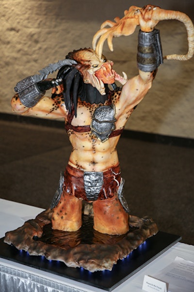Modeling chocolate, fondant, isomalt, and air-brushing created this entry in the sculpted cake category that was inspired by the Alien vs. Predator movie. This category did not have a designated theme, but entrants were instructed to demonstrate the art of sculpture while defying the laws of gravity.