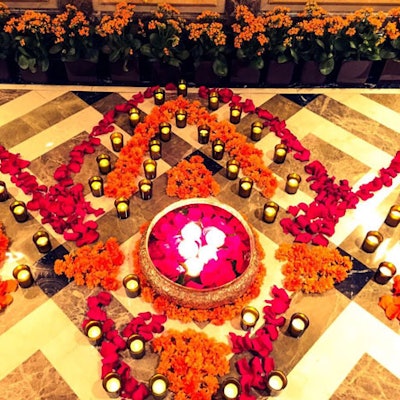 The Pierre, a Taj Hotel, hosts an annual Diwali celebration. In 2015, the New York hotel's lobby was decked out with Rangoli, a holiday decor element in which patterns made with flower petals or other dry, colored materials—such as sand or rice—are created on the floor.