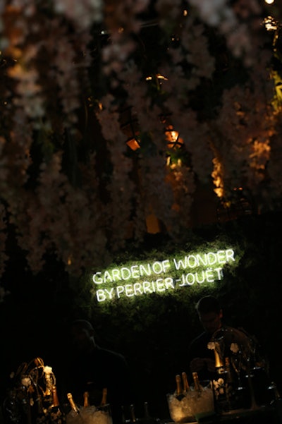 Sponsor Perrier-Jouët featured a champagne garden that was designated by a neon green sign.